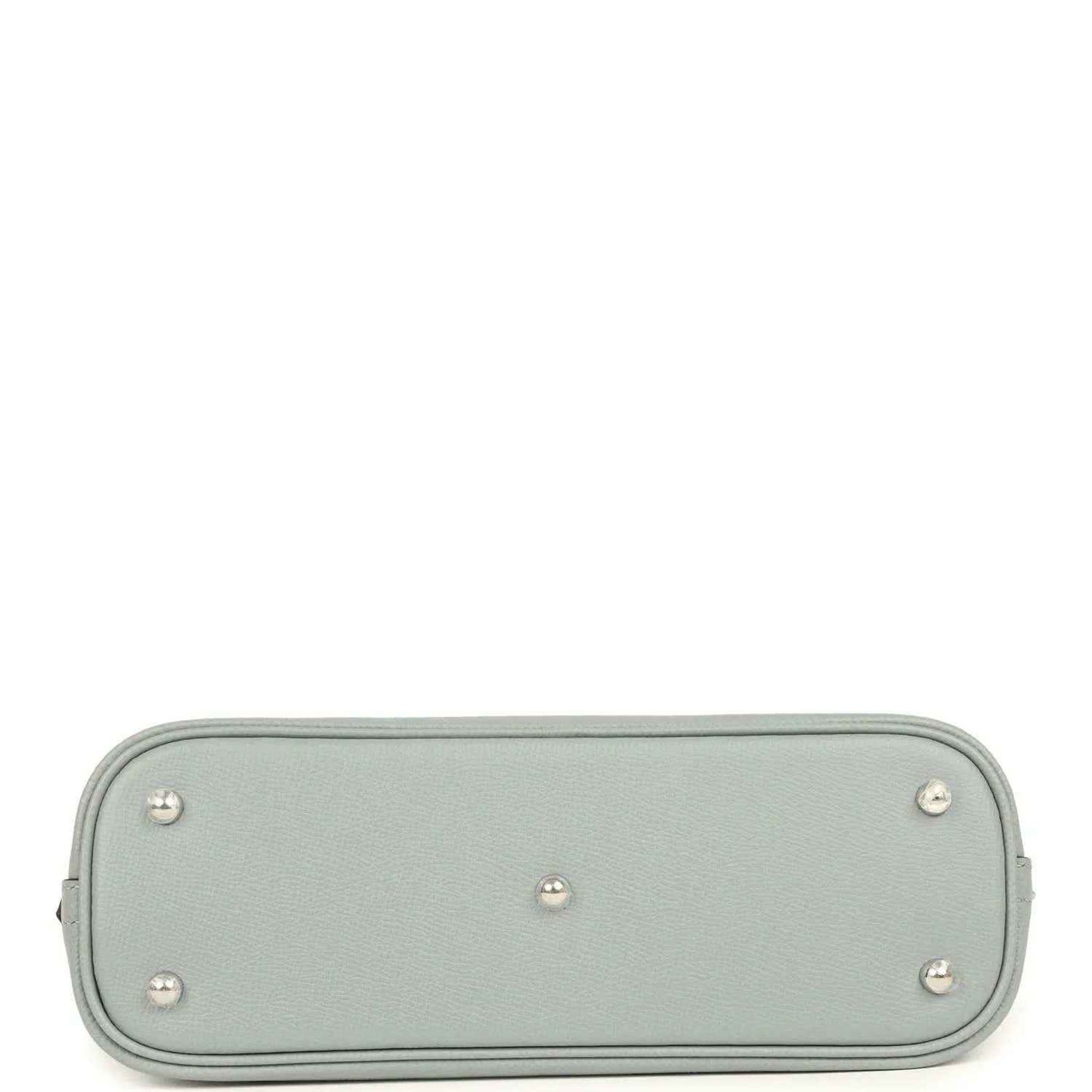 Light gray leather handbag base with four metal feet studs and rounded corners