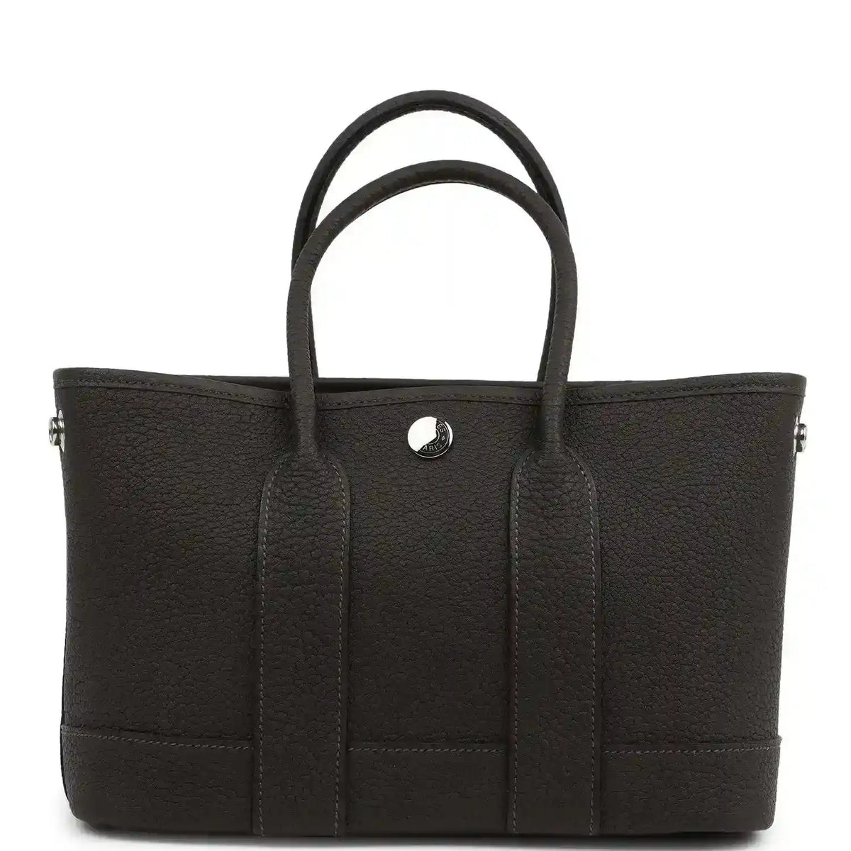 Leather tote bag with top handles, front patch pockets and center button