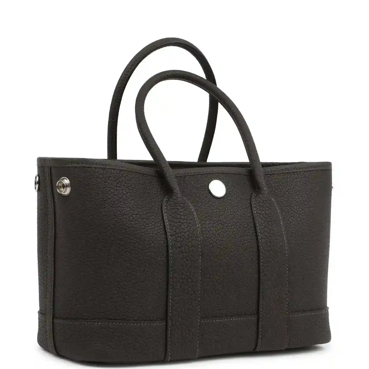 Leather tote bag with top handles, front panel pockets and small metal snap