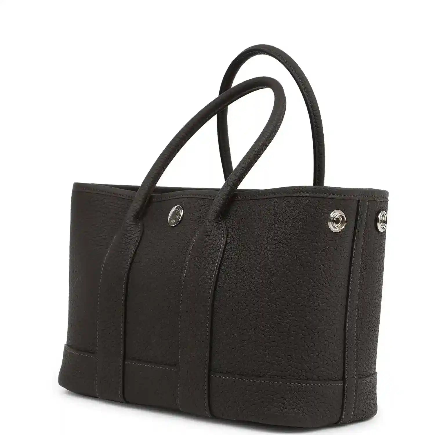 Leather tote bag with top handles and side front pockets, metal snap hardware