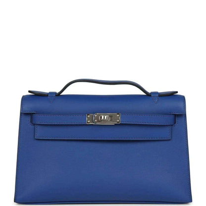 Hermes Kelly Pochette royal blue leather with front flap and palladium-tone clasp