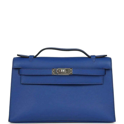 Hermes Kelly Pochette royal blue leather with front flap and palladium-tone clasp