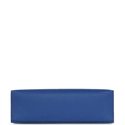 Hermes Kelly Pochette royal blue leather back panel