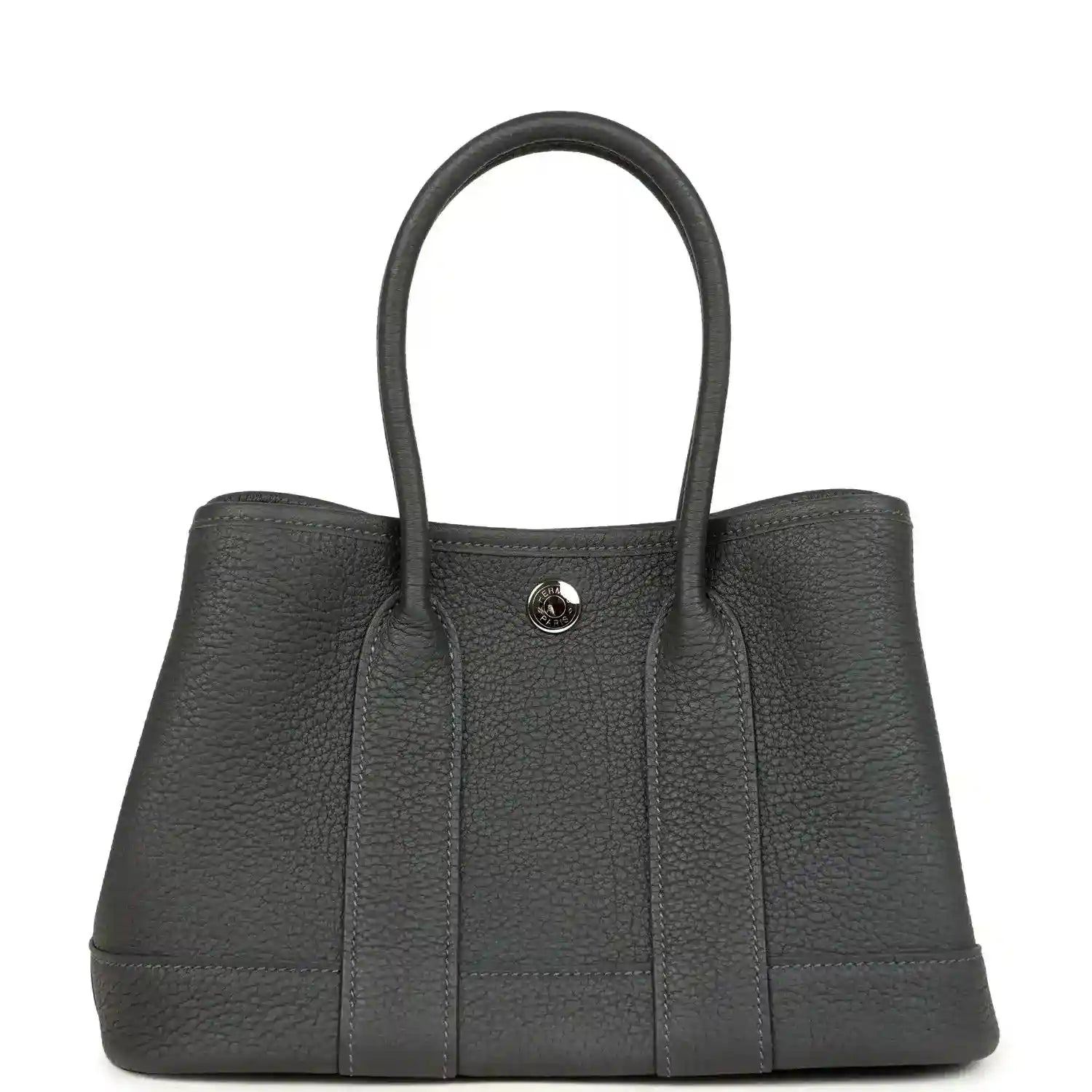 Dark gray leather tote bag with top handles and round front logo clasp