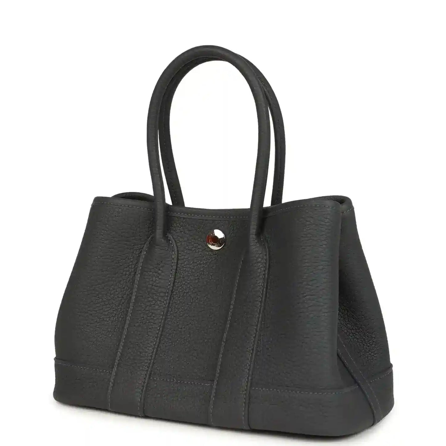 Dark gray leather tote bag with top handles, curved bottom, and front panel seams