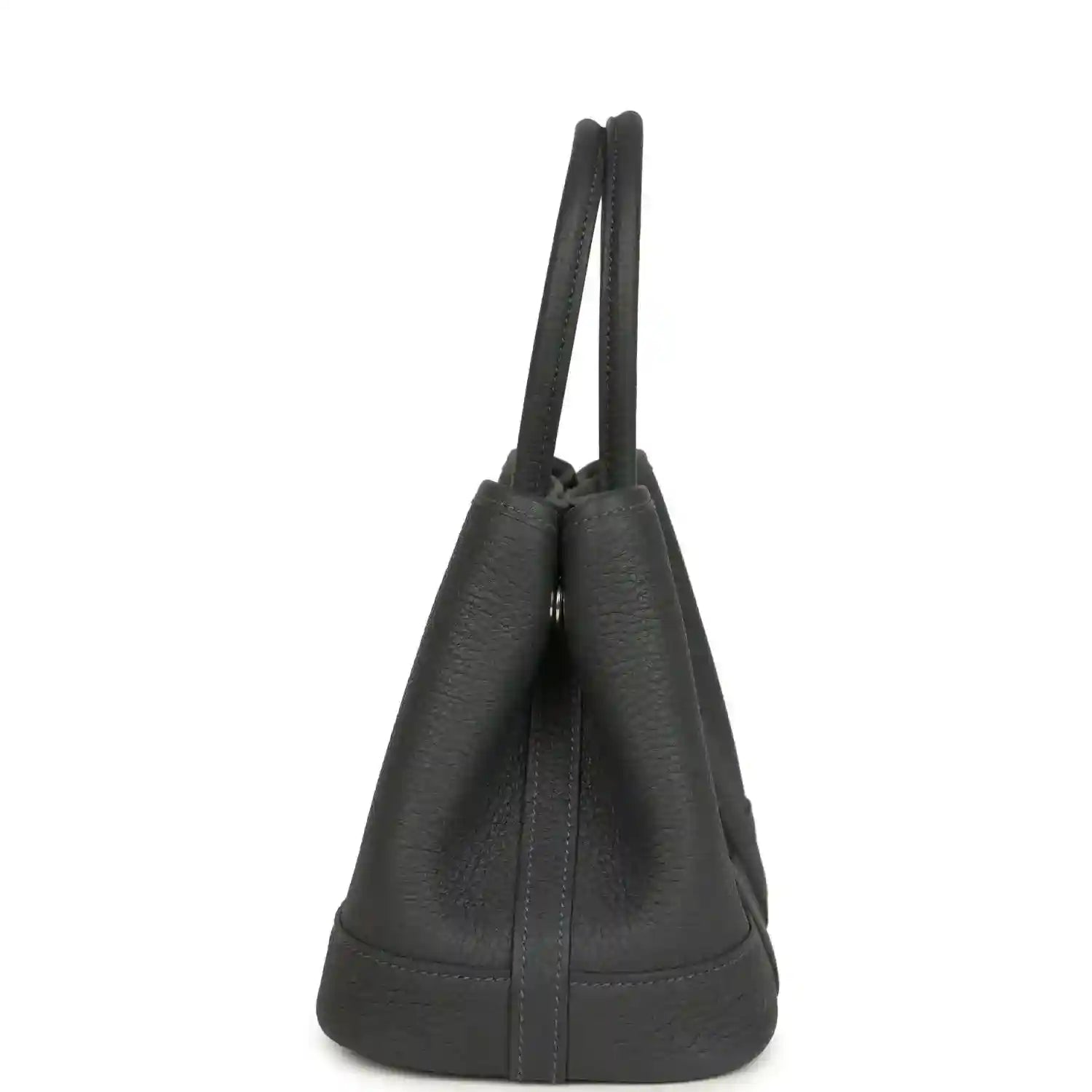 Dark gray leather tote bag viewed from the side with double top handles