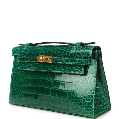 Hermes Kelly pochette bag in shiny green alligator leather with gold front clasp