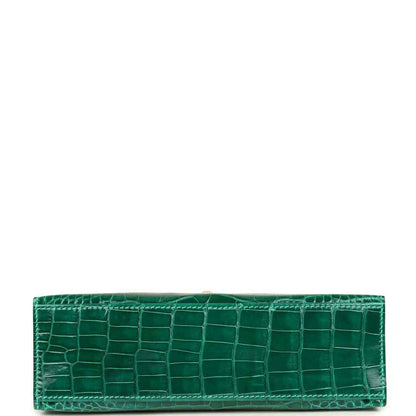 Hermes Kelly pochette bag in shiny green alligator leather with top handle loop