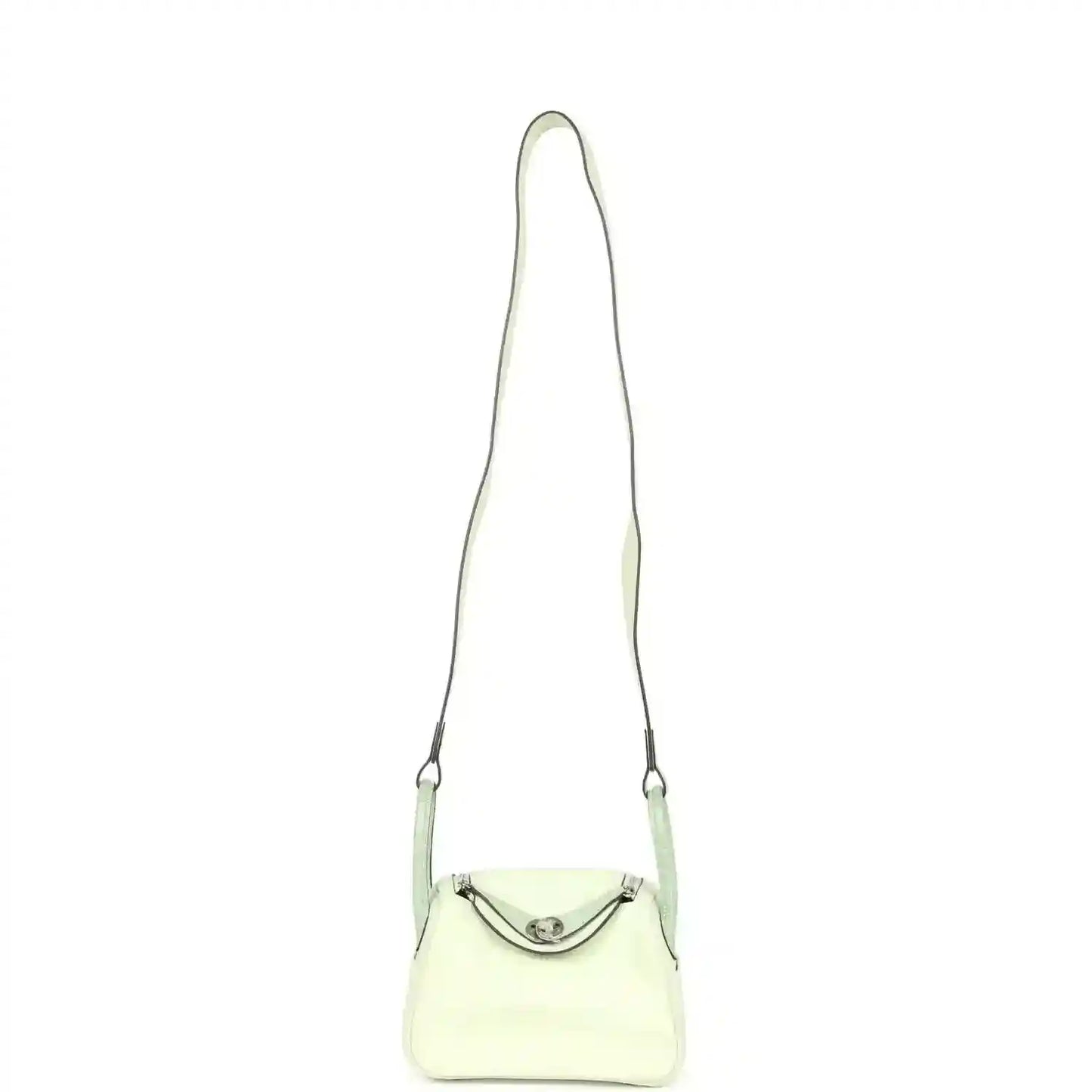 Mini Lindy mini bag on long strap, pale green leather with curved front clasp