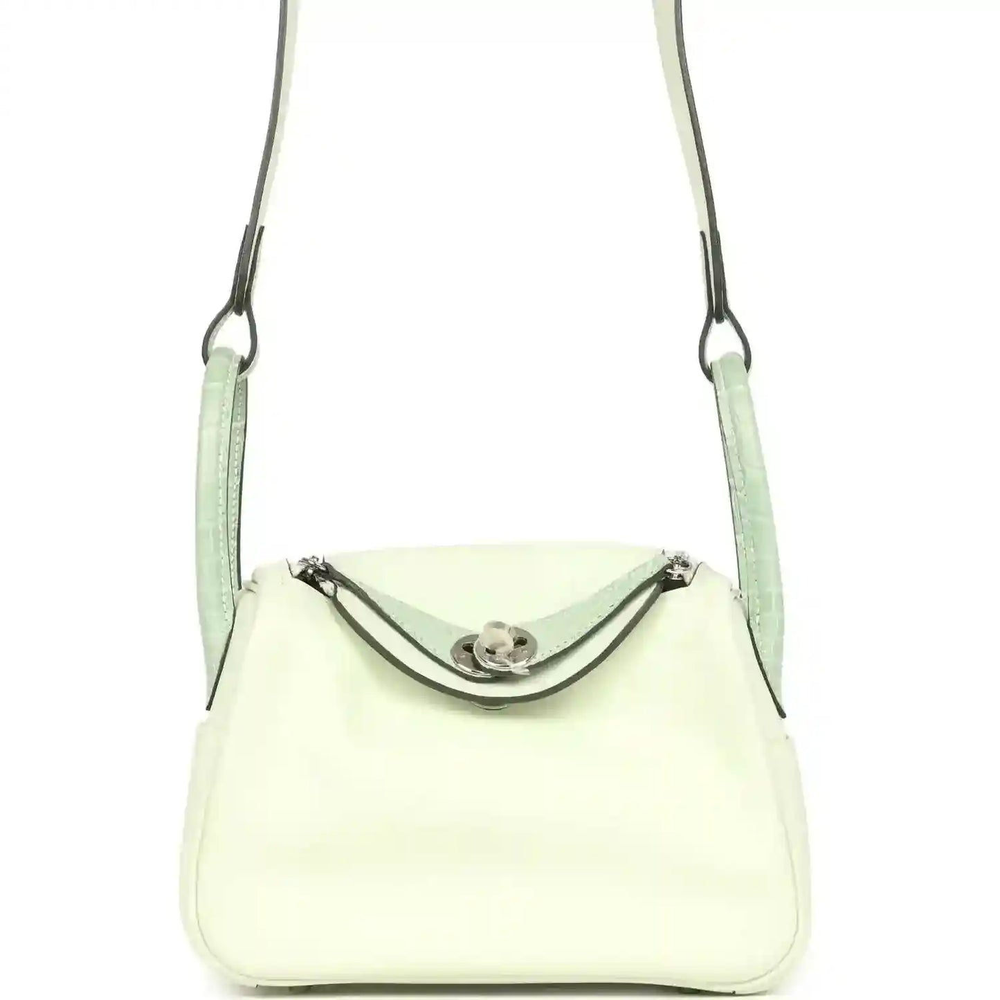 Mini Lindy crossbody bag in pale green and light cream leather, curved front flap