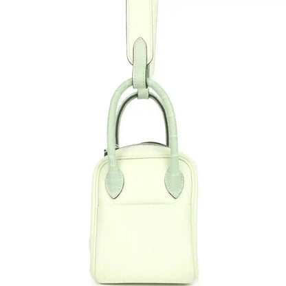Mini Lindy bag with top handle, pale green leather and rounded silver-tone hardware