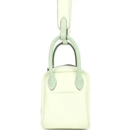 Mini Lindy bag with top handle, pale green leather and rounded silver-tone hardware