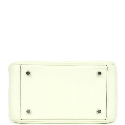 Mini Lindy bag base in light pale green leather with four metal feet