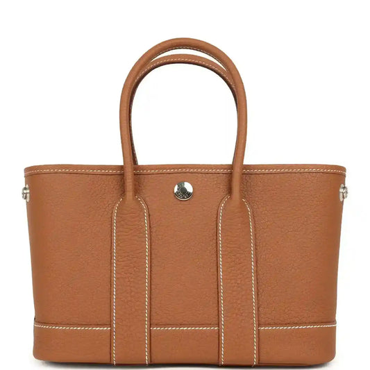 Hermes Garden Party Neo 23 tote bag in gold-toned leather, two handles, front pocket tab