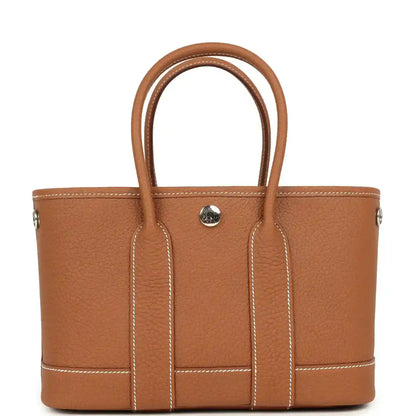 Hermes Garden Party Neo 23 tote bag, gold-toned leather with top handles and central front panel