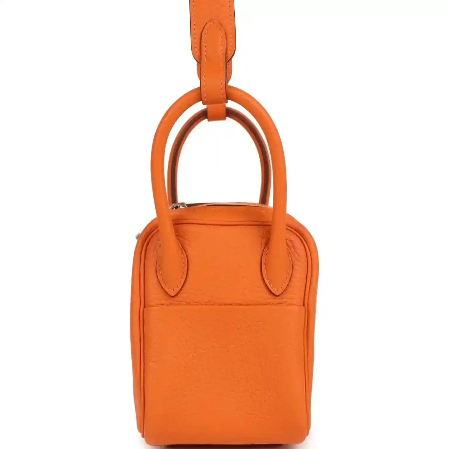 Orange leather mini handbag with top handle, rounded sides, and front decorative metal clasp.