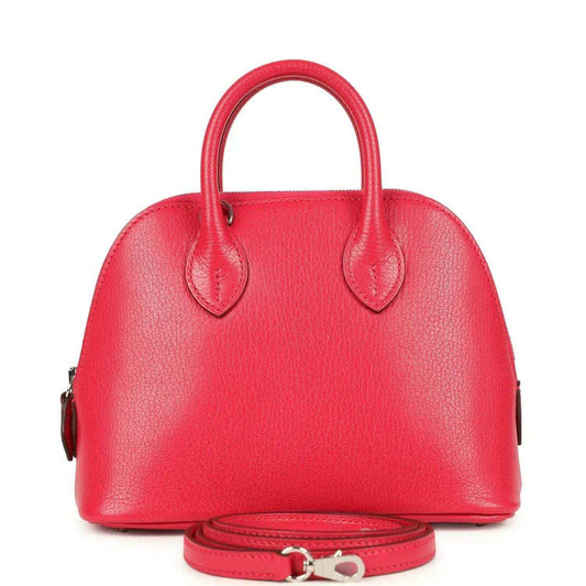 Hermes mini Bolide bag in red leather with top handles and matching crossbody strap