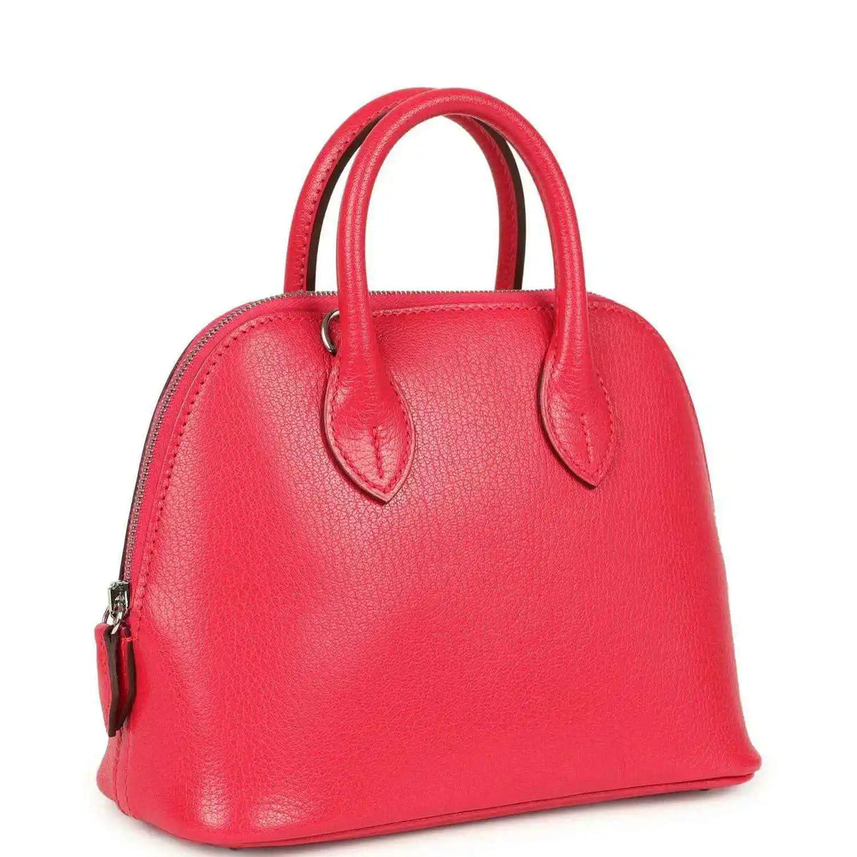 Hermes mini Bolide bag in red leather with top handles and structured curved shape
