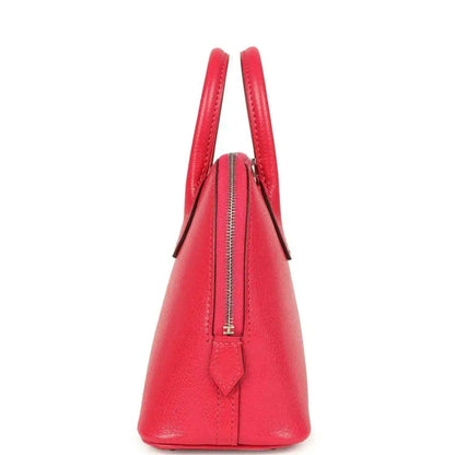 Hermes mini Bolide bag red leather side view with zipper pocket and top handles