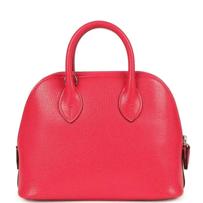 Hermes mini Bolide bag in red leather with top handles and smooth curved front