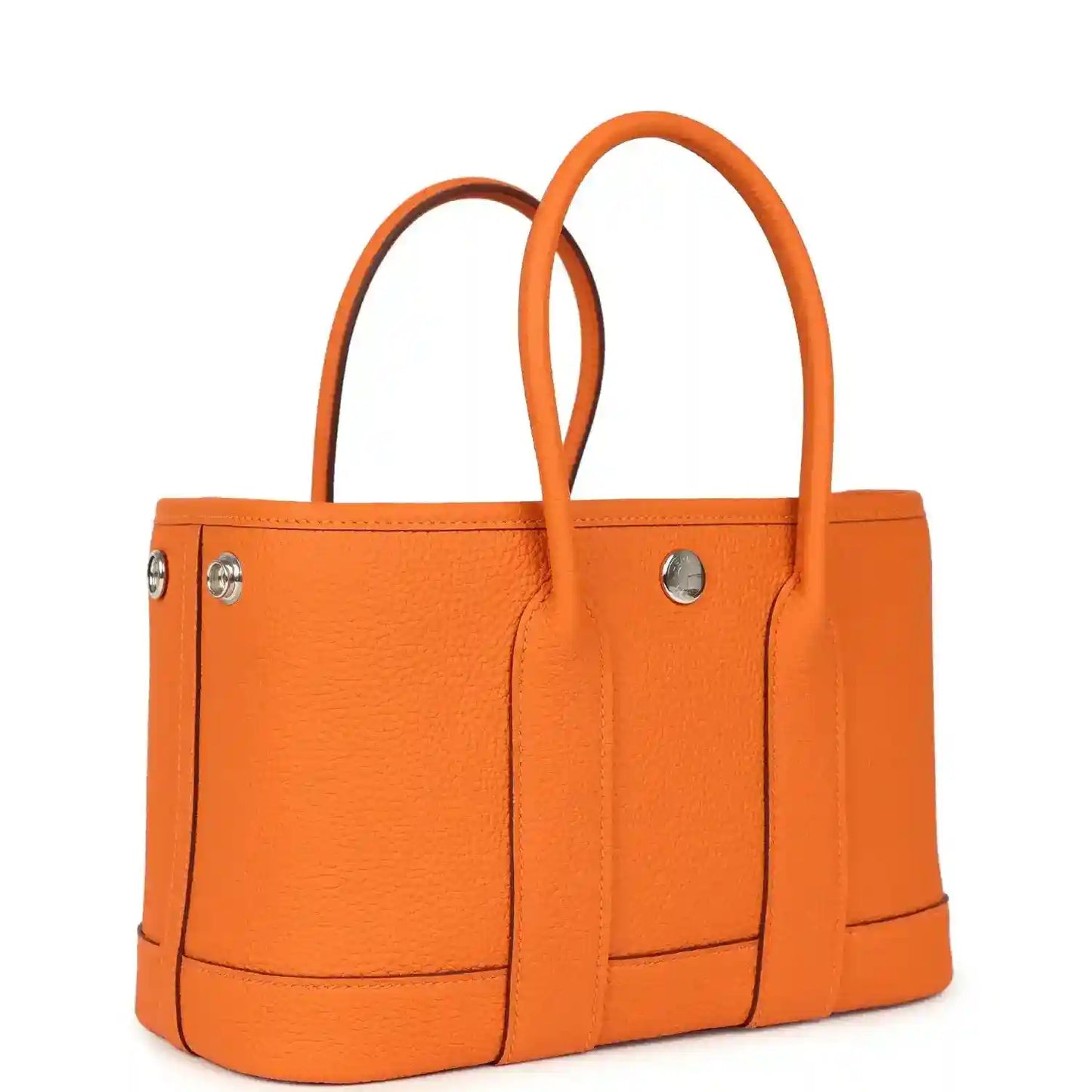 Orange leather tote bag with dual handles and front stitched panels