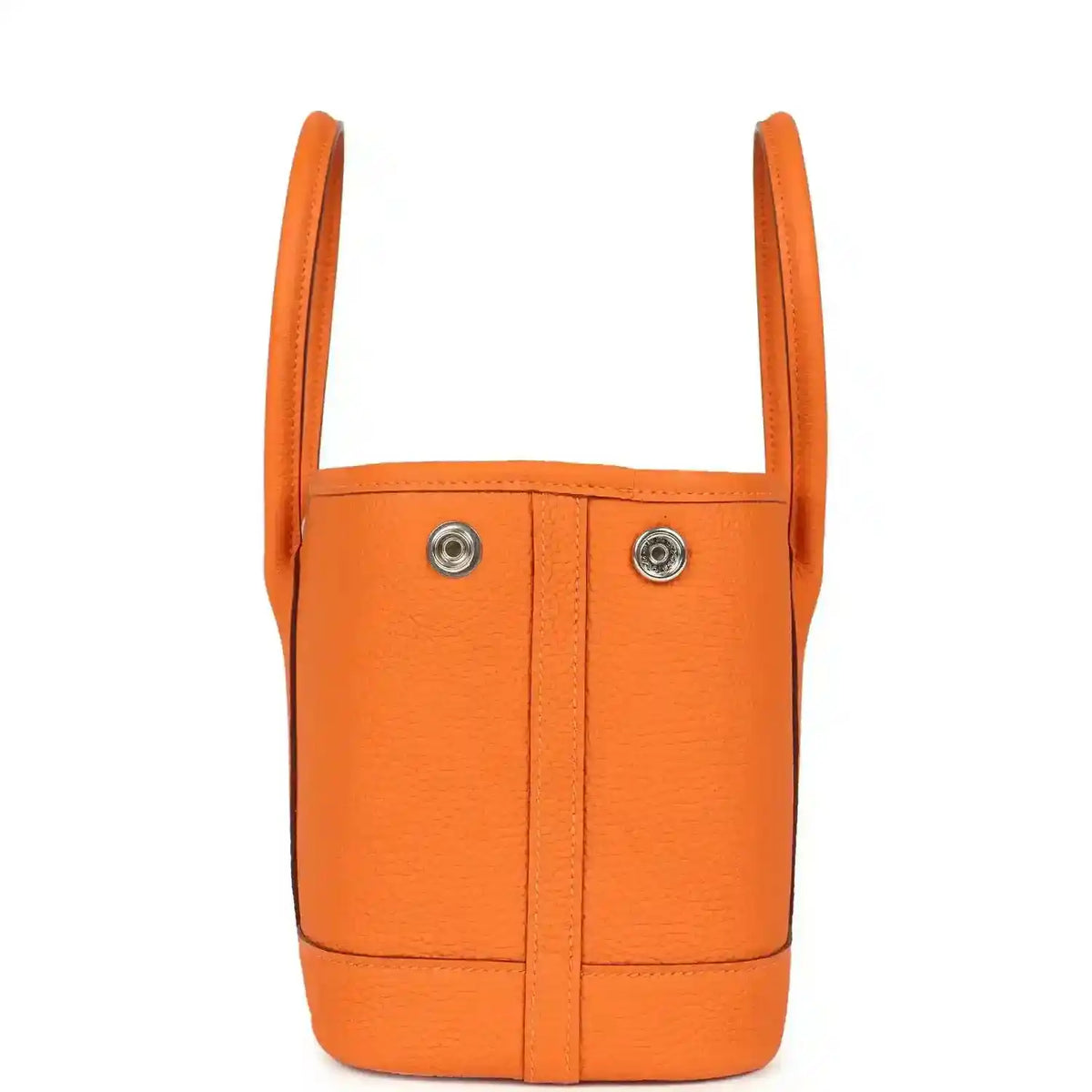 Orange leather mini tote bag with two top handles and vertical seams