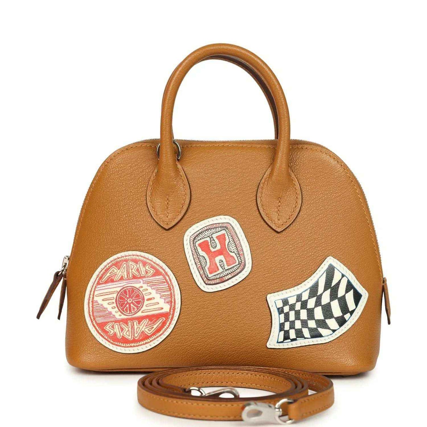 Mini leather handbag in tan with two top handles and colorful logo patches