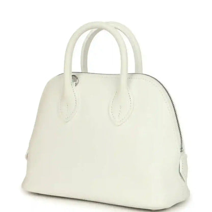 White leather Hermes mini Bolide bag with full front view and side zipper detail