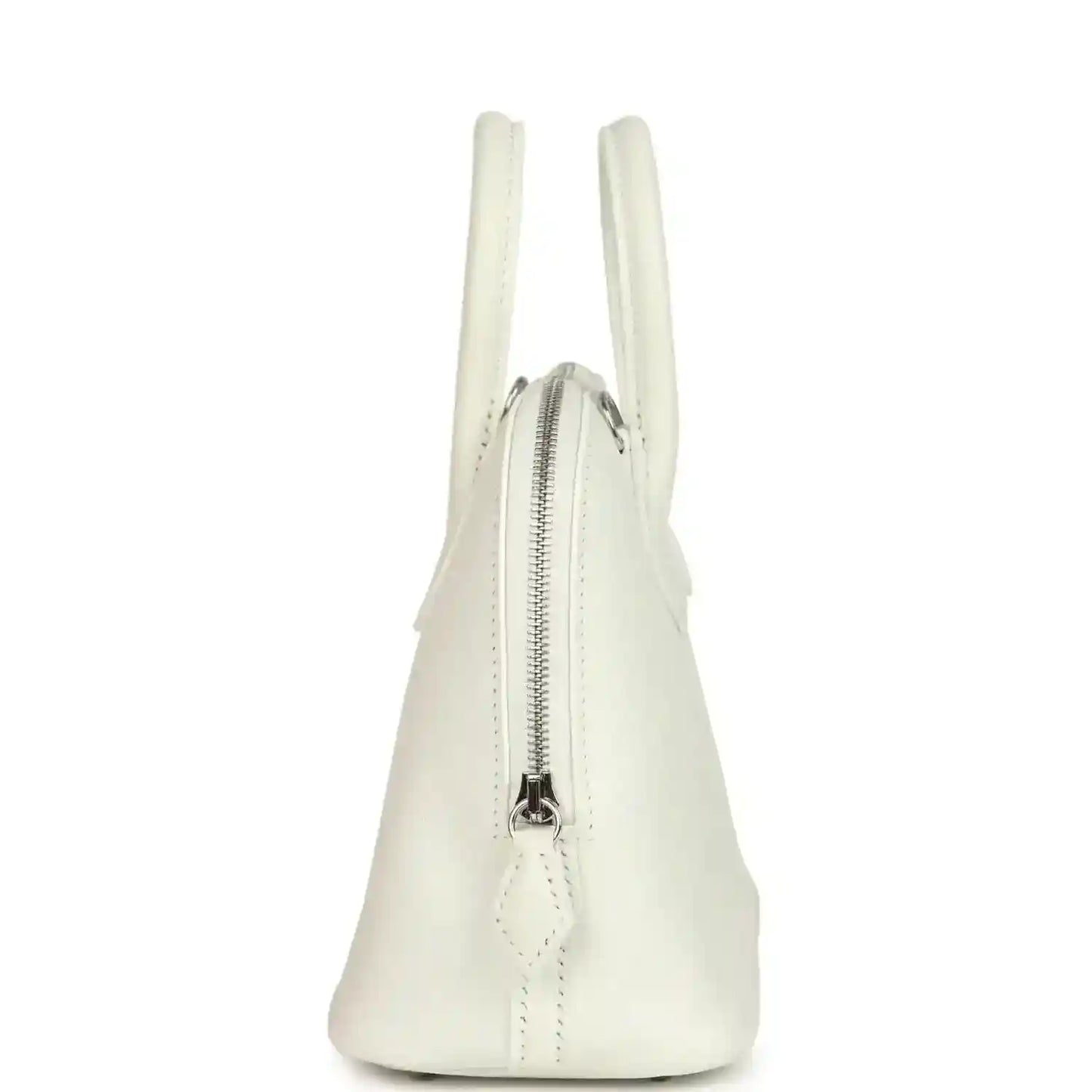 White Hermes mini Bolide bag showing side profile and front zipper pull