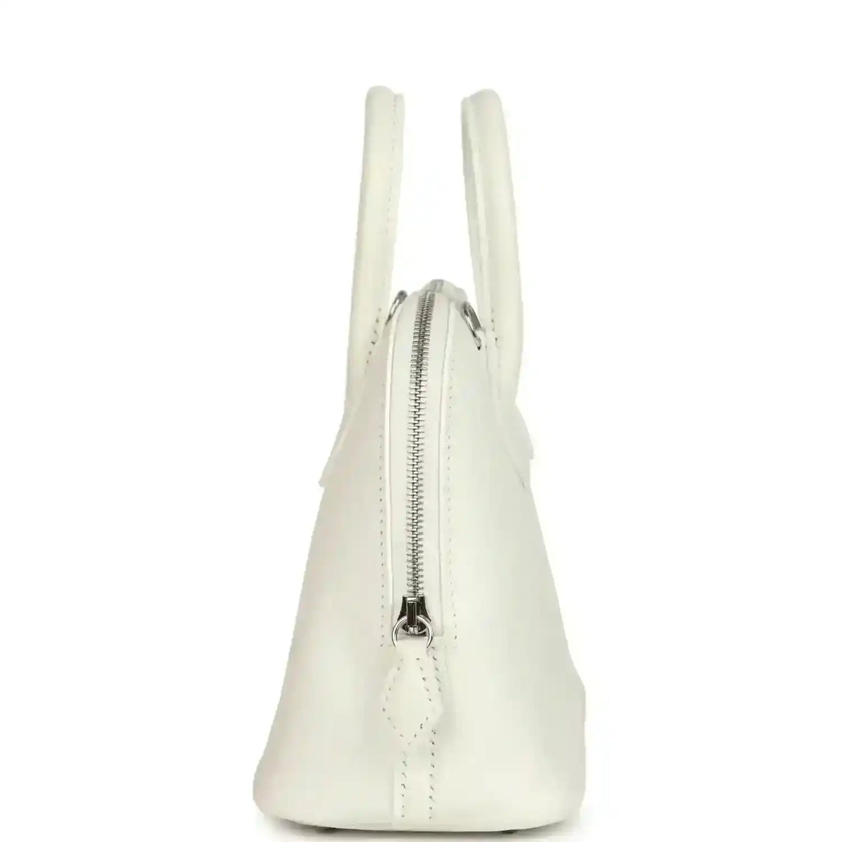 White Hermes mini Bolide bag showing side profile and front zipper pull