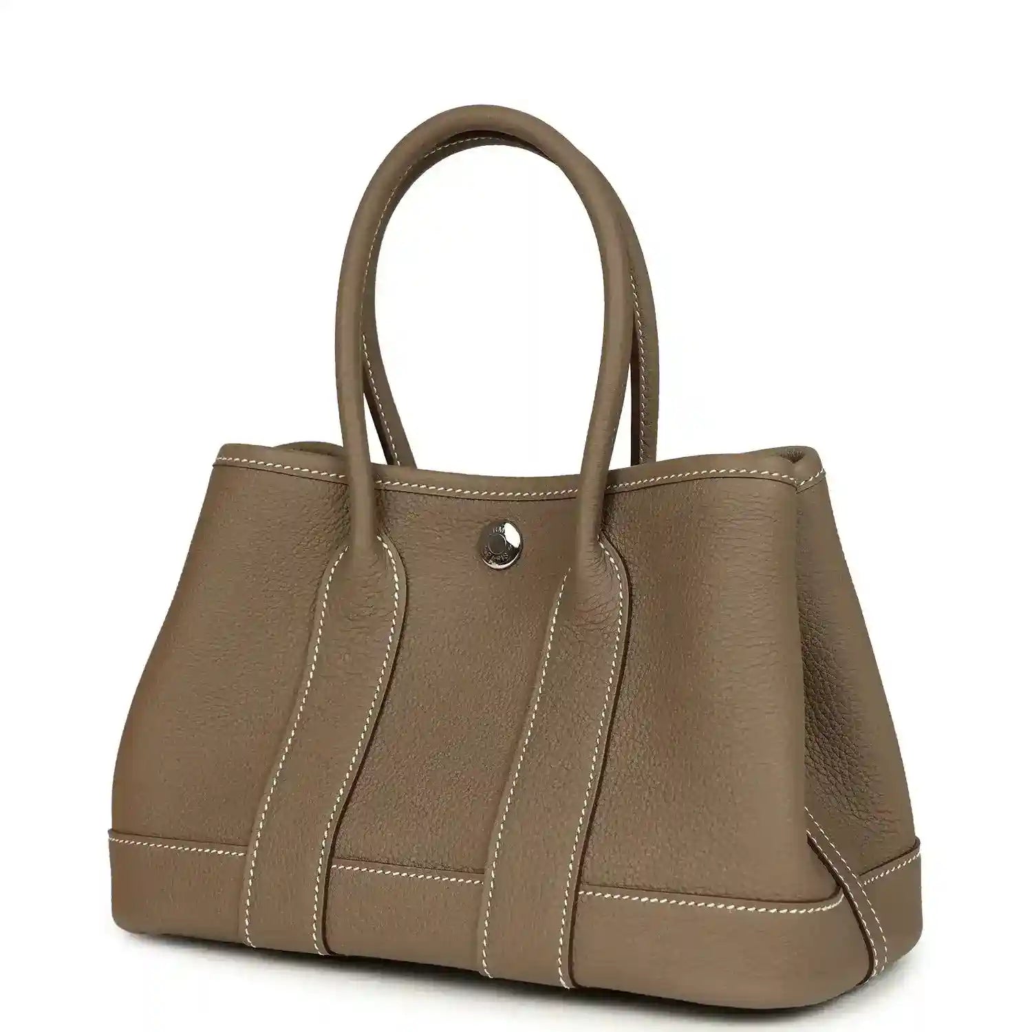 Taupe leather mini tote bag with top handles and front snap button, paneled sides