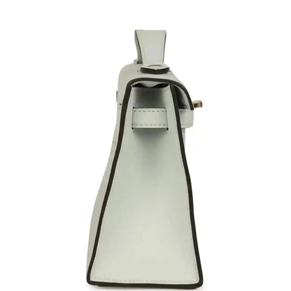 Kelly-style leather pochette in light gray with open flap and interior compartment