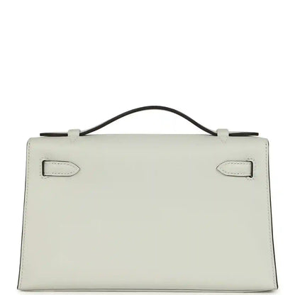 Hermès Kelly pochette in light gray Swift leather, front flap with side tabs