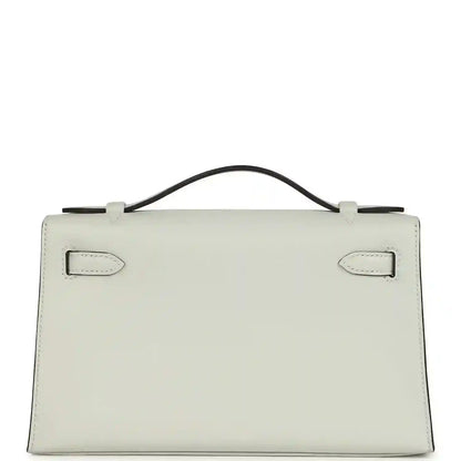 Hermès Kelly pochette in light gray Swift leather, front flap with side tabs