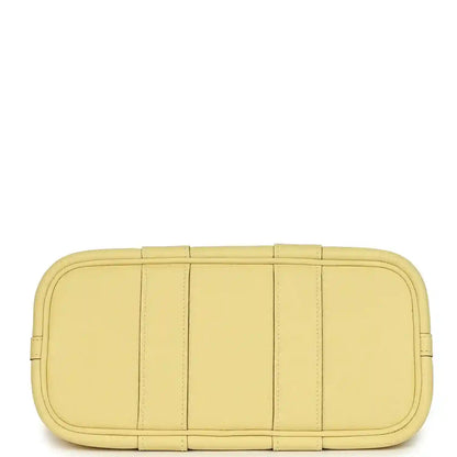 Yellow leather Neo 23 bag, horizontal panel stitching on the side and rounded ends