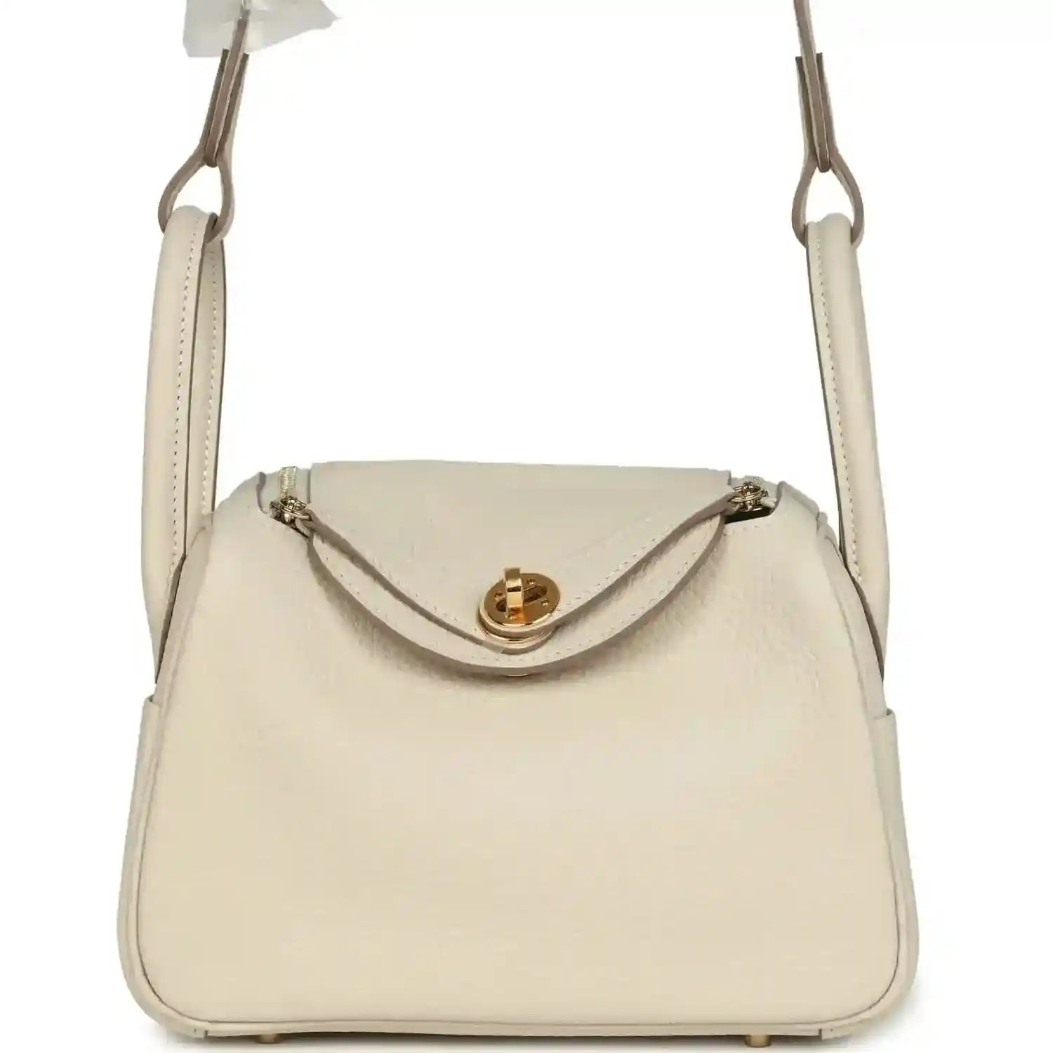 Hermes mini Lindy II bag, pale cream leather, gold clasp, two top handles
