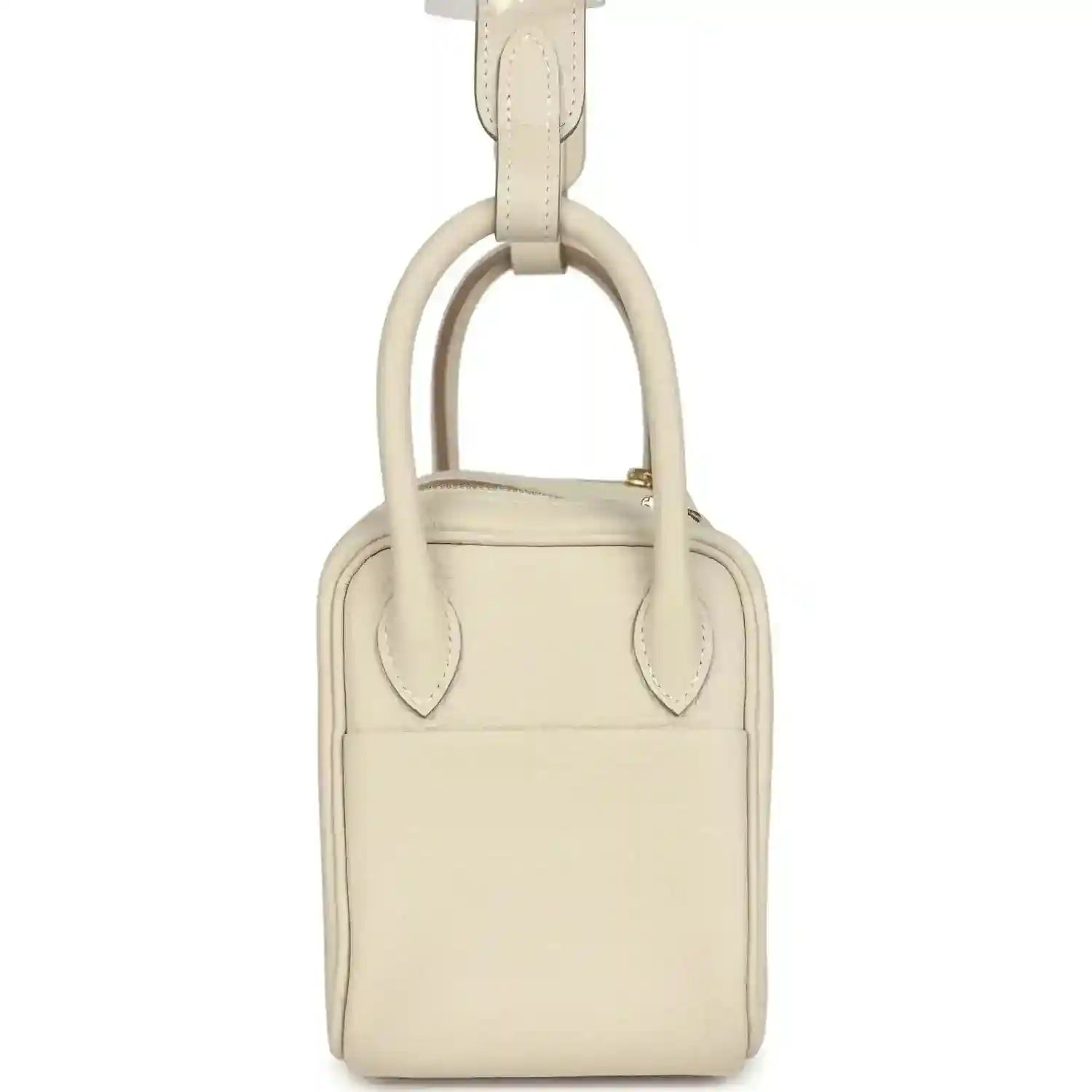 Hermes mini Lindy II bag, pale cream leather, top-handle strap loop, back view
