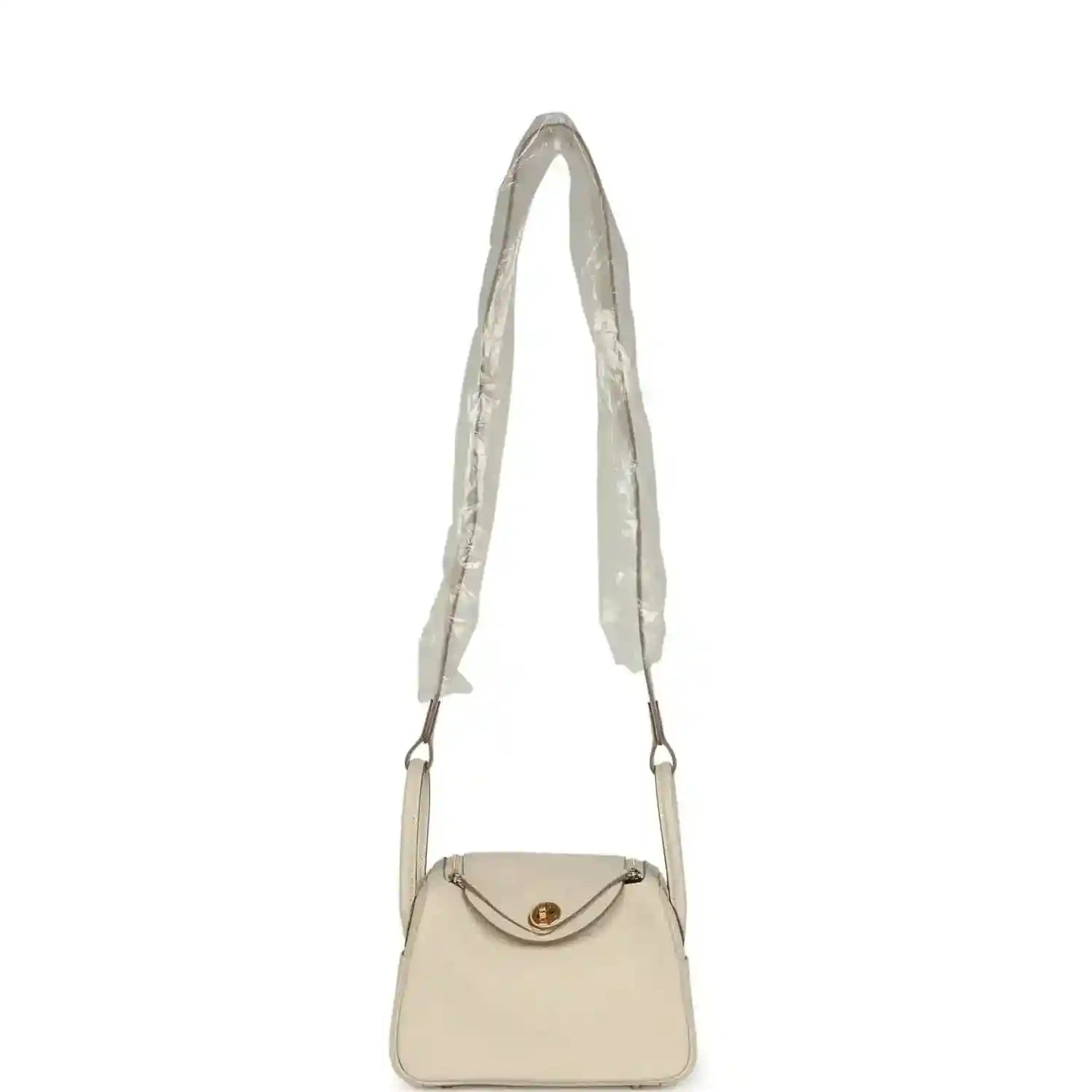 Hermes mini Lindy II bag, pale cream leather, long strap, small shoulder bag shape