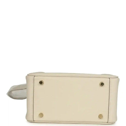 Hermes mini Lindy II bag base, pale cream leather with four gold feet