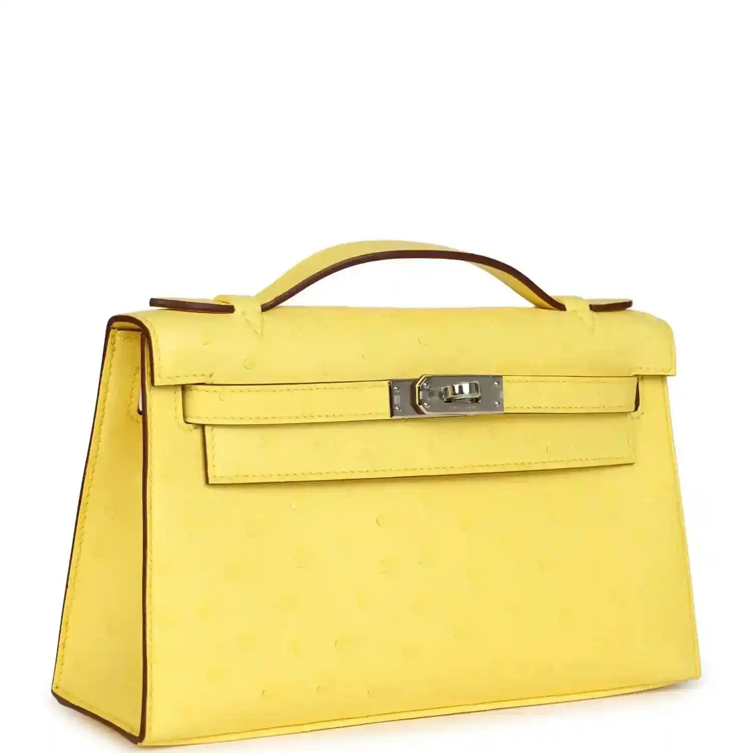 Yellow leather Kelly-style pochette with top handle and front flap, side view