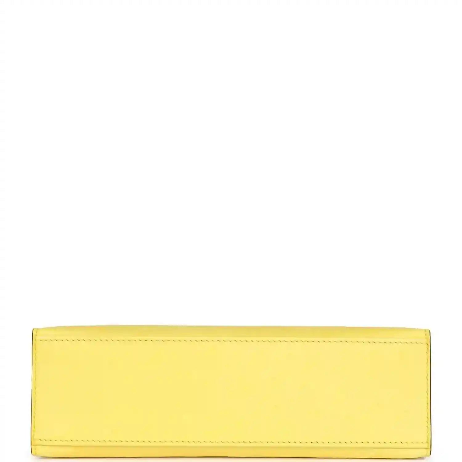 Yellow leather pochette interior with stitched rectangular lining panel