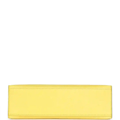 Yellow leather pochette interior with stitched rectangular lining panel