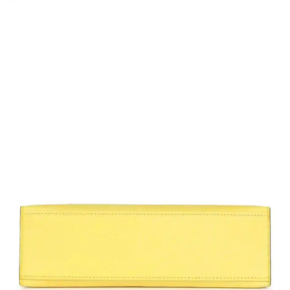 Yellow leather pochette interior with stitched rectangular lining panel