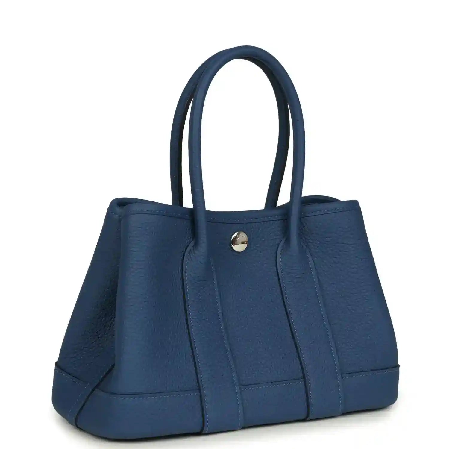 Blue leather tote with structured front panels and curved handles