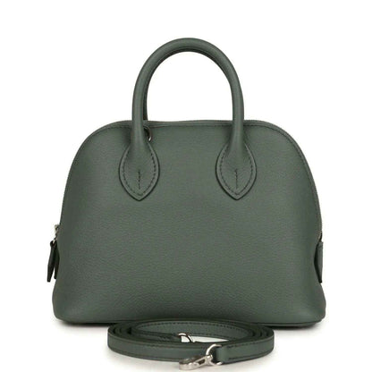 Mini Bolide handbag in dark green textured leather with top handles and silver-tone hardware