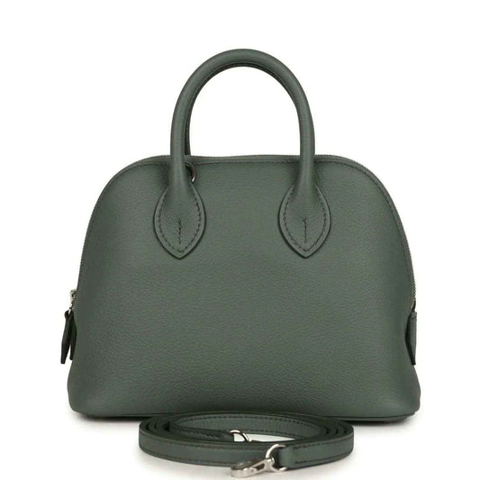 Mini Bolide handbag in dark green textured leather with top handles and silver-tone hardware