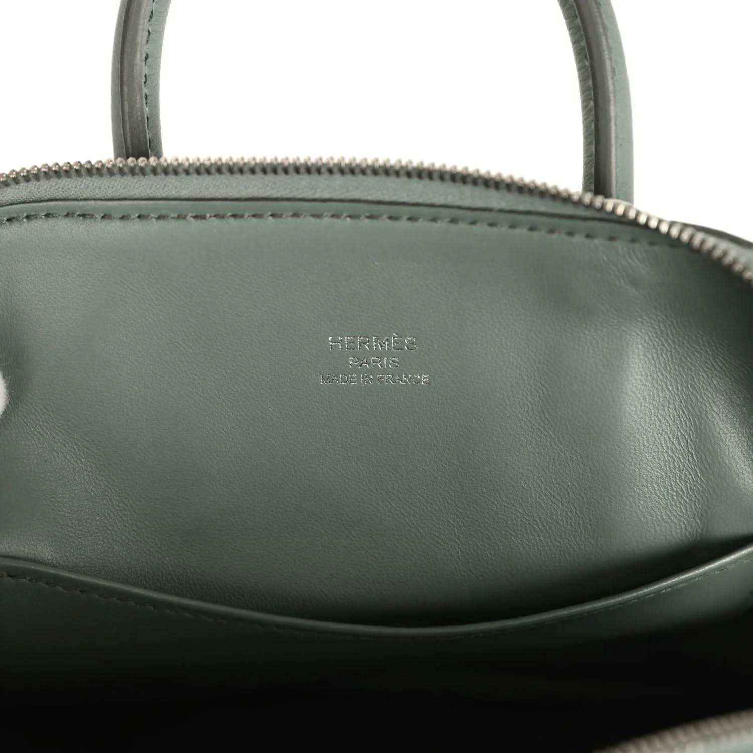 Mini Bolide handbag with Hermes logo on dark green leather lining