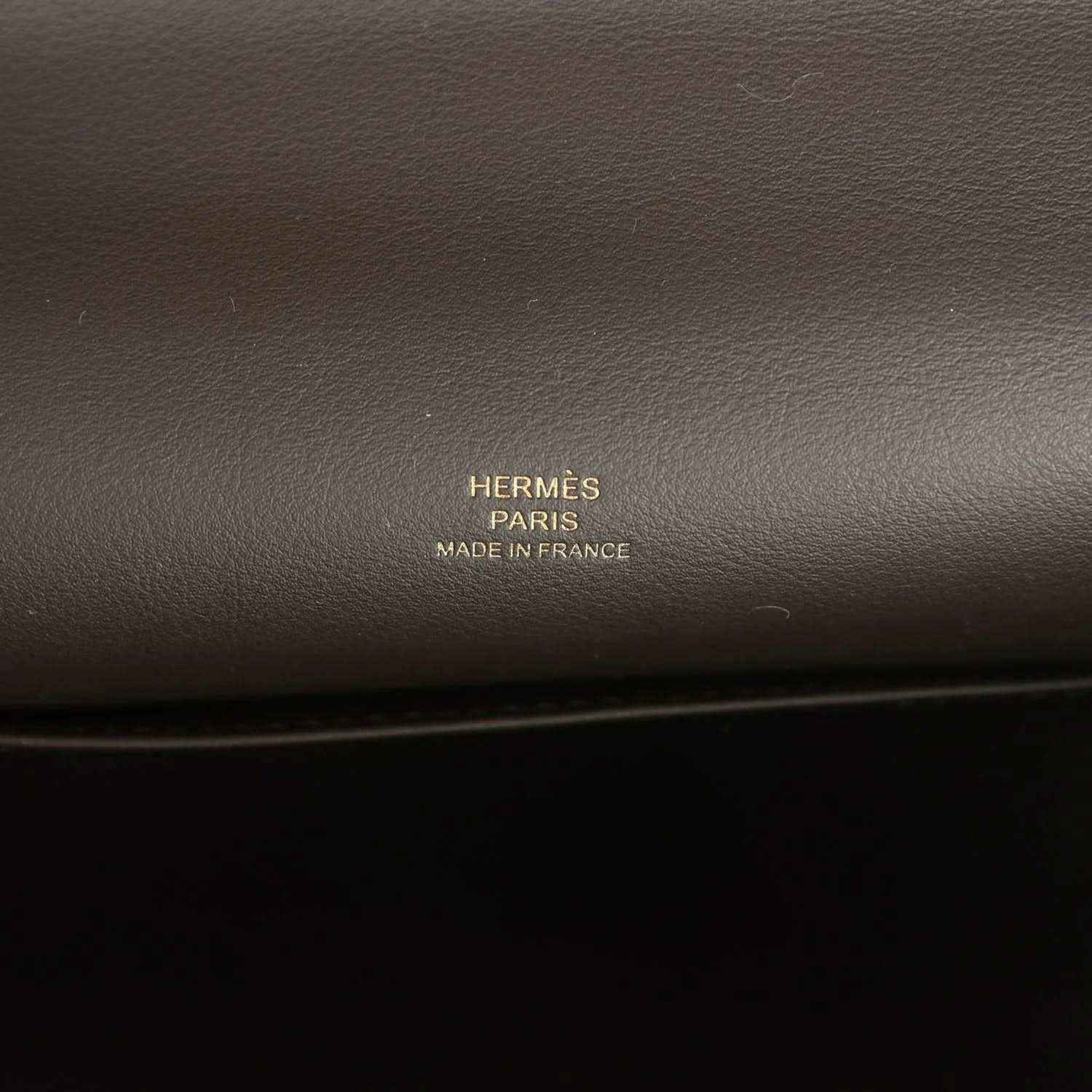 Hermès Paris made in France stamp on dark brown leather