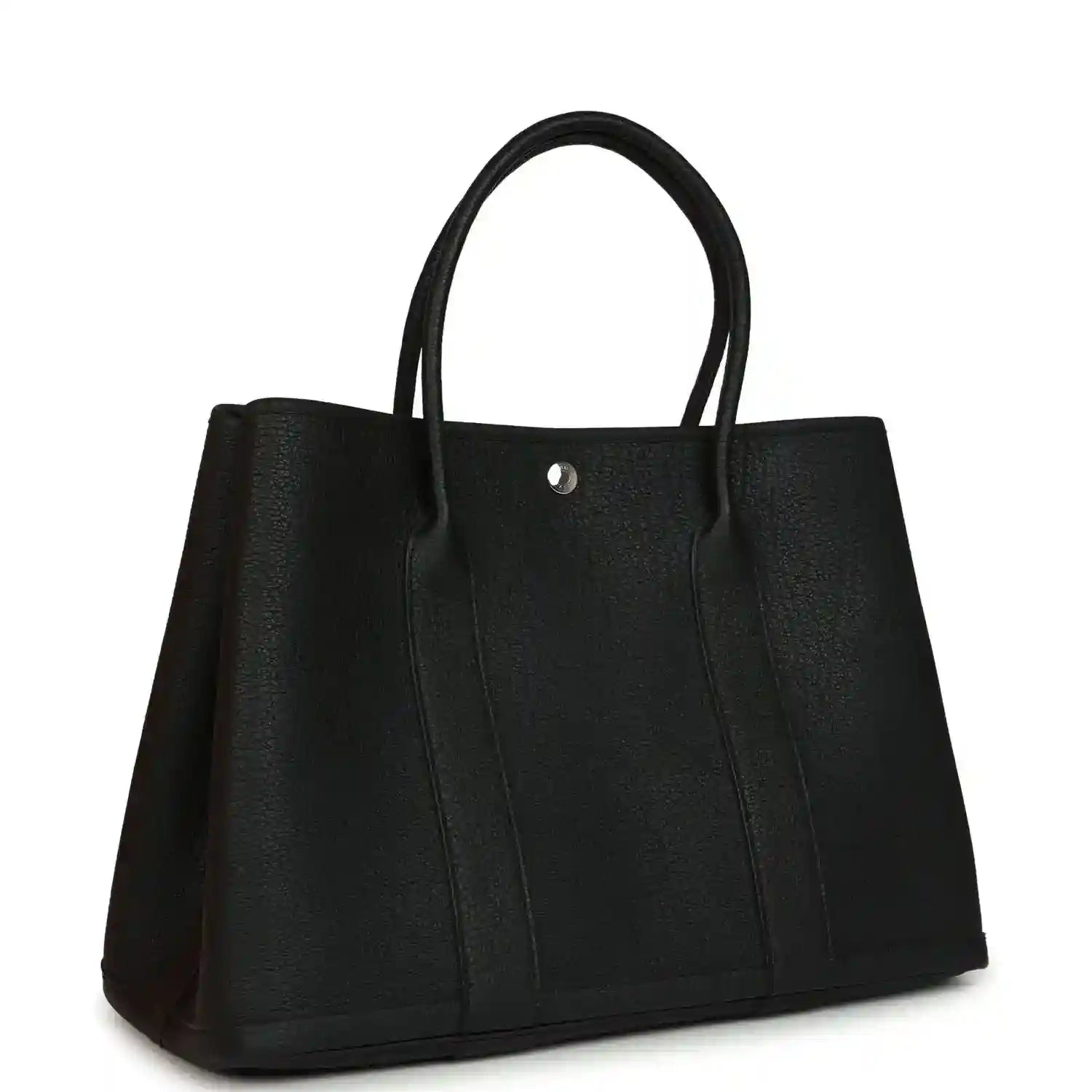 Black leather tote bag with wide sides, top handles, and center snap button