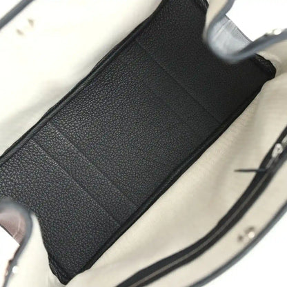 Black leather strap with textured grain and stitched edge